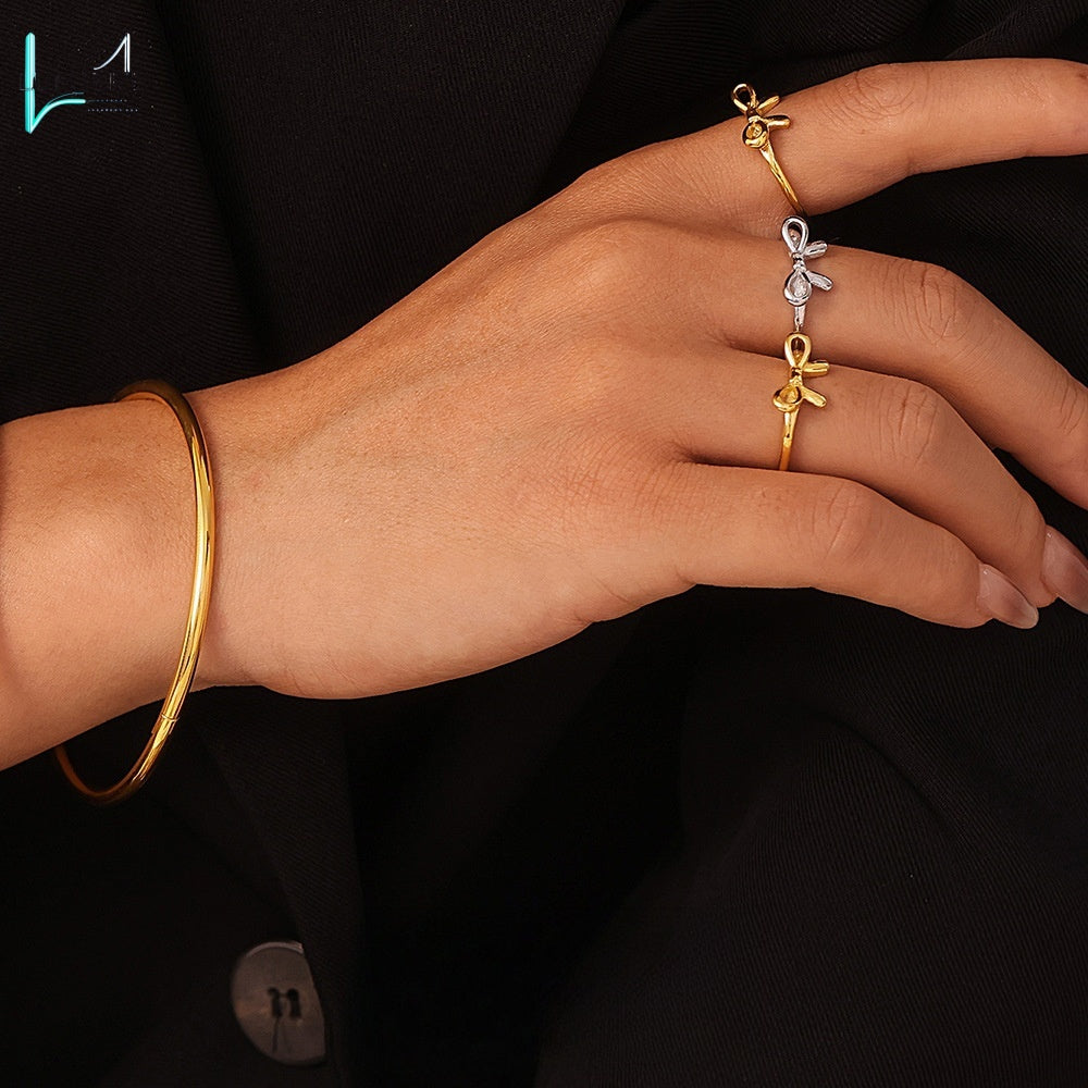 Stainless steel PVD plated 18K gold bow ring bracelet set