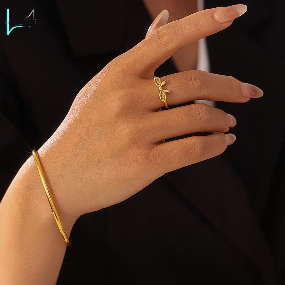 Stainless steel PVD plated 18K gold bow ring bracelet set