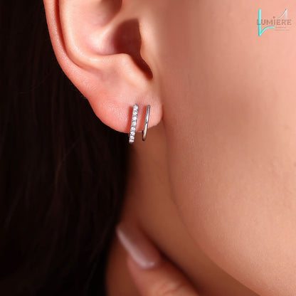 Double layered small C-shaped earrings with inlaid diamonds