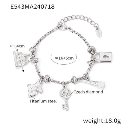 Titanium plated 18K gold multi-element hanging tag with diamond inlaid pendant bracelet